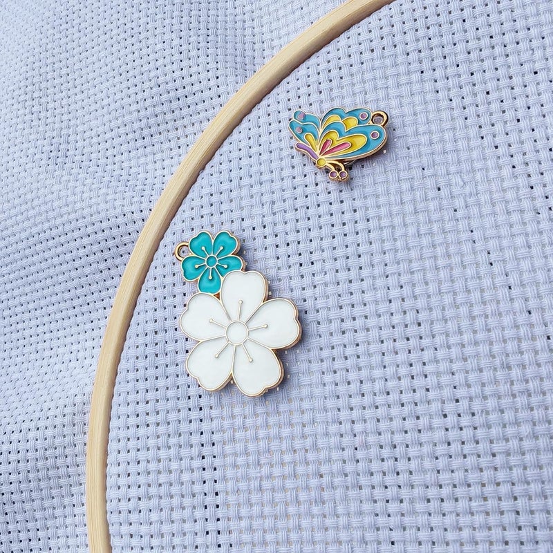 ESWEUOOM 2 Pieces Flower Butterfly Needle Minders, Women Magnetic Needle Nanny Keeper, Cute Cross Stitch Embroidery Needlepoint Needlework Accessories Set for Sewing Needle and Pin Holders (Blue) - Image 1